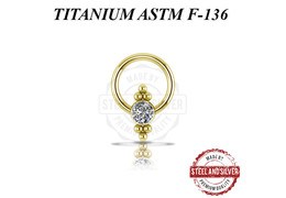 Кольцо из титана Steel and Silver с золотым покрытием и кластером Swarovski Кольцо из титана Steel and Silver с золотым покрытием и кластером Swarovski